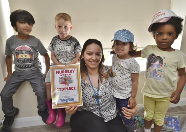 Ashley Beroznyckyi and children at the PT Nursery of the Year 3rd place-  Little Stars Nursery at Dogsthorpe Road EMN-190306-160447009