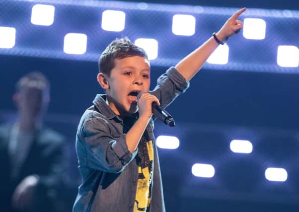 George performs on The Voice Kids airing on  ITV.  Picture:  (C) ITV Plc