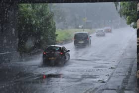 Rain, weather, flooding pix .  traffic gong under Oundle Road bridge EMN-200813-153616009