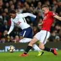 Ethan Hamilton (red) playing for Manchester United against Spurs in a Premier 2 match. Photo: Getty Images.