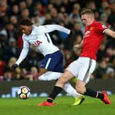 Ethan Hamilton (red) playing for Manchester United against Spurs in a Premier 2 match. Photo: Getty Images.