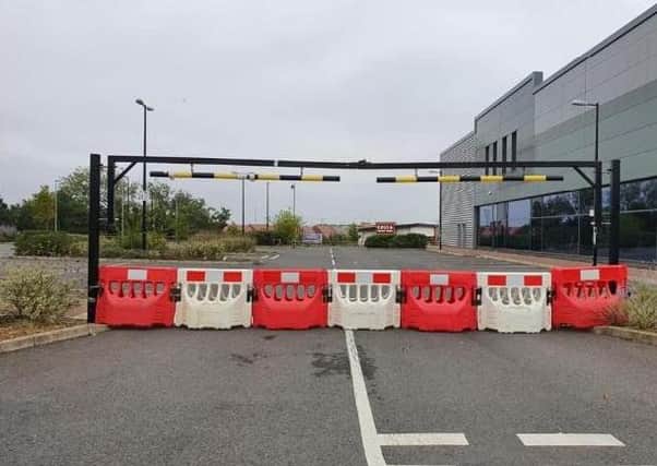 Barriers have been put in place to block the entrance to the Vivacity Premier Fitness car park
