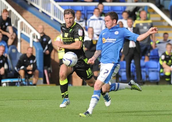 Danny Swanson in action for Posh.