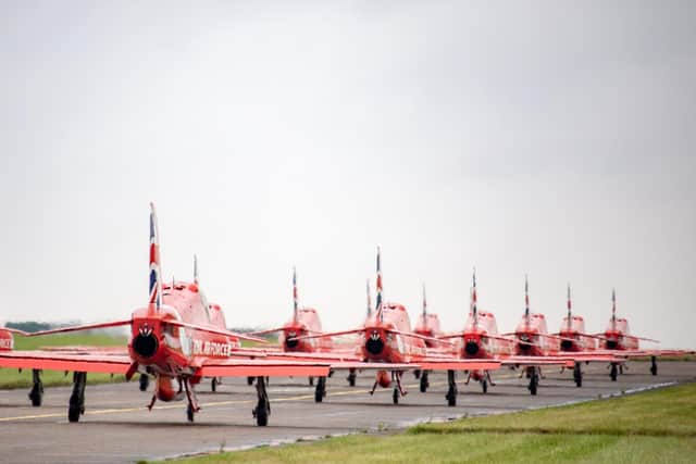 Image shows The Royal Air Force Aerobatic Team (The Red Arrows) taxiing shortly before departing their home base of RAF Scampton in Lincolnshire.