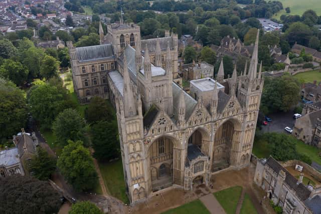 Drone footage taken as Stonemason Kate Holmes abseils down Peterborough Cathedral to carry out a laser scan on what the team claim is the most digitally recorded historic building in the world. Picture: Joe Giddens/PA Wire