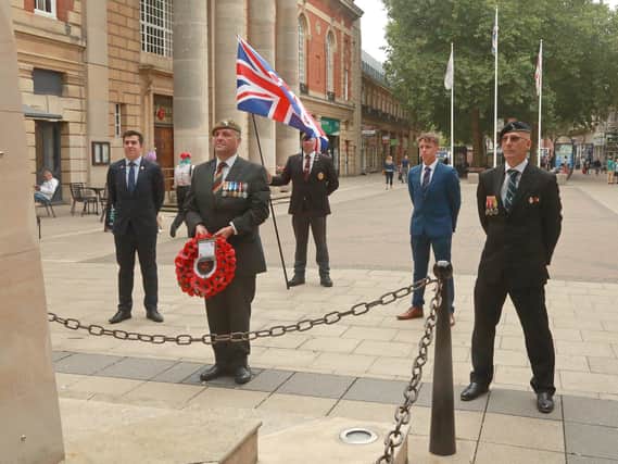 Wreaths are placed at the Peterborough War Memorial. Photos Doug Stuart/Cambs ACF