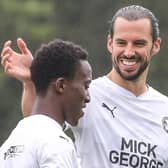 George Boyd congratulates Siriki Dembele on his goal in the 2-1 friendly defeat to Derby County on Wednesday