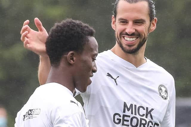 George Boyd congratulates Siriki Dembele on his goal in the 2-1 friendly defeat to Derby County on Wednesday