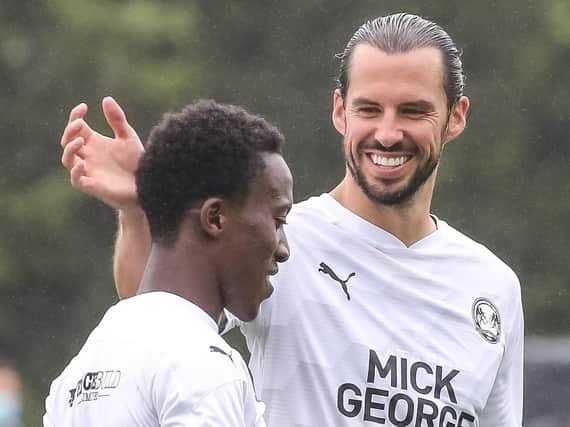 George Boyd congratulates Siriki Dembele on his goal in the 2-1 friendly defeat to Derby County on Wednesday