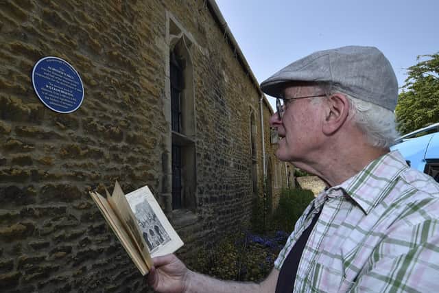 Blue plaque at the Almoner's Hall, Cathedral Precints with Henry Duckett from the Civic Society.