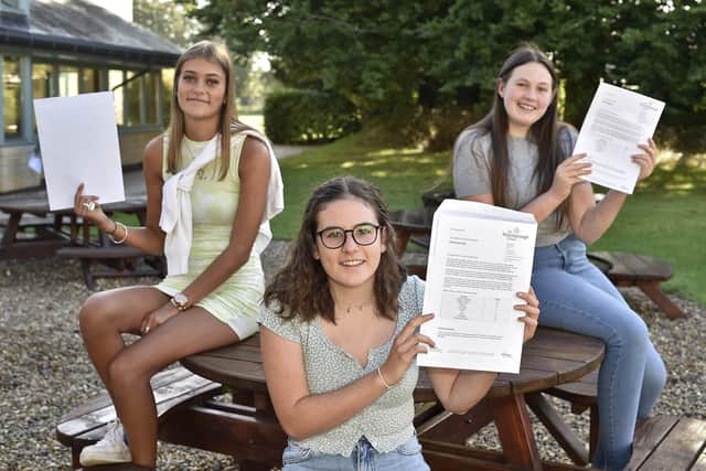 GCSE results day 2020. Peterborough School students Chloe Mills, Charlotte Hemens and Amelia Lawson EMN-200820-093751009