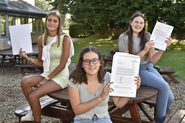 GCSE results day 2020. Peterborough School students  Chloe Mills, Charlotte Hemens and Amelia Lawson EMN-200820-093751009