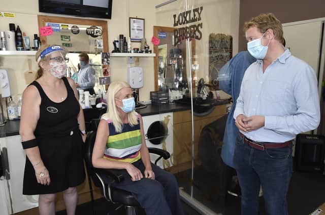 Amanda Milling, Chairman of the Conservative Party, visiting Loxley Barbers with Paul Bristow MP meeting Lisa Aldridge the proprietor EMN-200820-161553009