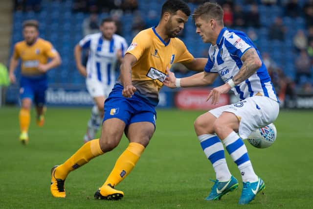 Frankie Kent (right) in action for Colchester.
