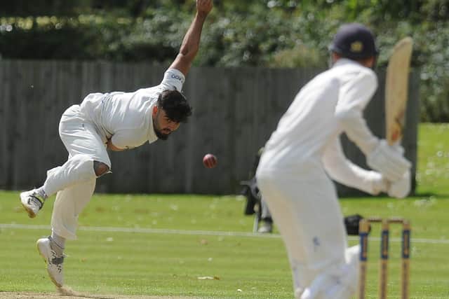 Mohammed Danyaal bowling for Peterborough Town against Finedon.