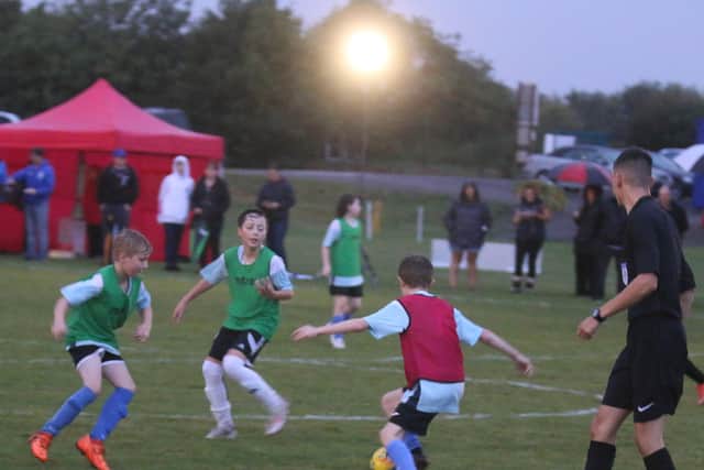 Football. action from the first match played under the new protable floodlights in Whittlesey. Photo: RWT Photography.