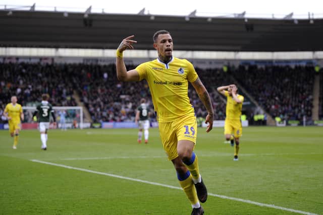 Jonson Clarke-Harris celebrates a goal for Bristol Rovers.