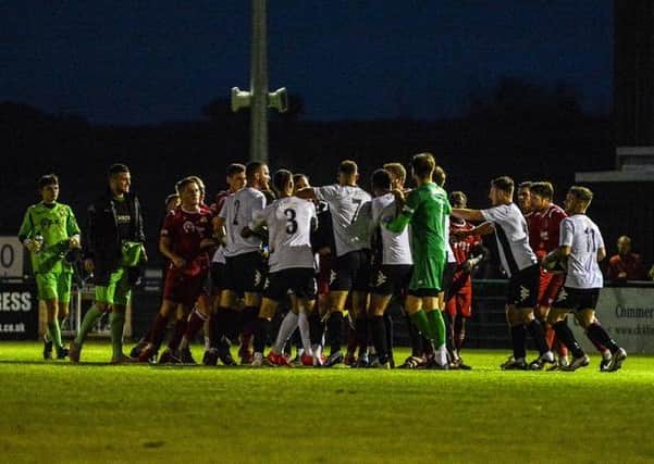 A confrontation between the players of Stamford and Grantham. Photo: Daniel Allen.