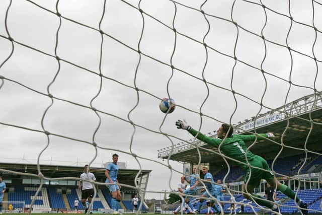 Ryan Broom's shot for Posh thumps into the Coventry net. Photo: Joe Dent/theposh.com.