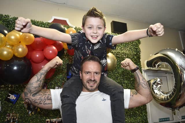 George Elliott, the Voice Kids finalist, at a finals party at the Post Office Club, Bourges Boulevard with uncle Jamie Harrison.