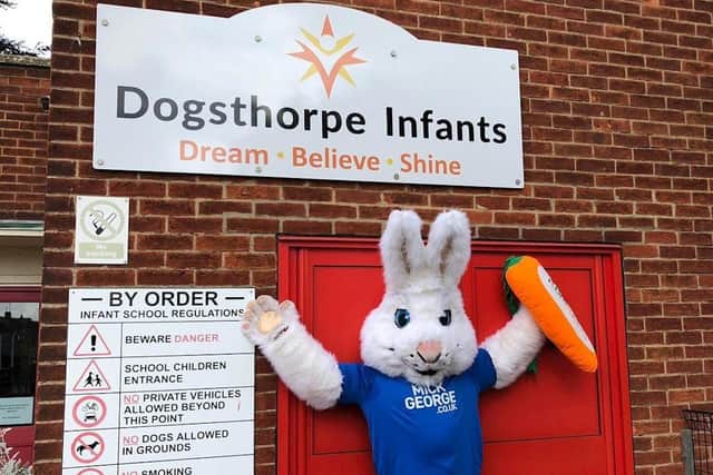 Posh mascot Peter Burrow at Dogsthorpe Infants School.
