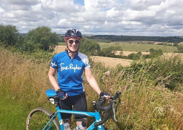 Staff member at Sue Ryder Thorpe Hall Hospice completing part of their cycle