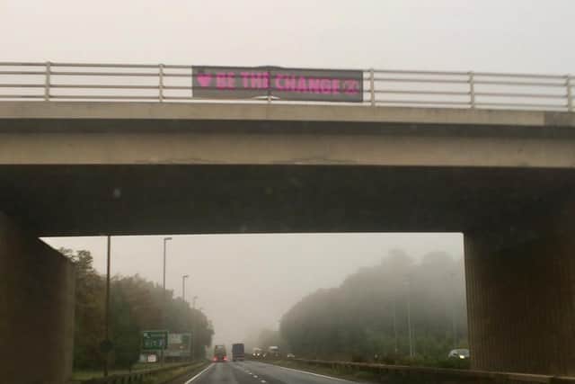 An Extinction Rebellion banner by the A1. Photo: Extinction Rebellion