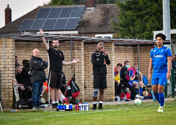 New Peterborough Northern Star boss Dwayne Rankin (centre) looks on as his team bow out of the FA Cup. Photo: James Richardson.