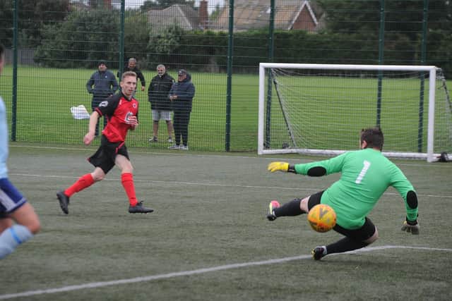 Tommy Randall scores for Netherton United in their friendly success over Barley Mow. Photo: David Lowndes.