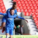 George Cooper celebrates a goal for Posh at Doncaster in February, 2019. Photo: Joe Dent/theposh.com.