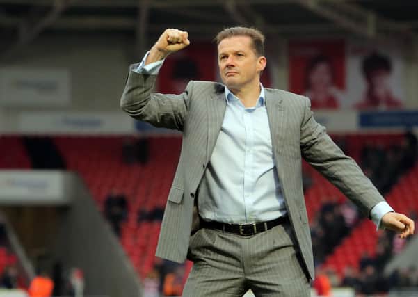 Peterborough United Manager Graham Westley celebrates a win at Doncaster.