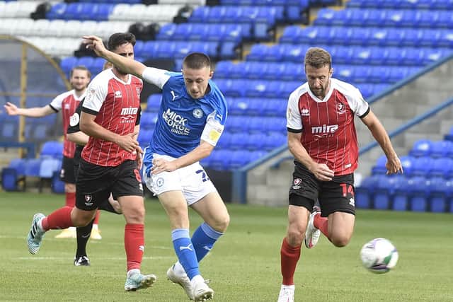 Posh midfielder Jack Taylor shoots at the Cheltenham goal. Photo: David Lowndes.
