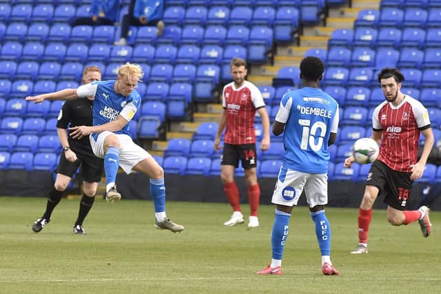 Posh midfielder Ryan Broom shoots at the Cheltenham goal. Photo: David Lowndes.