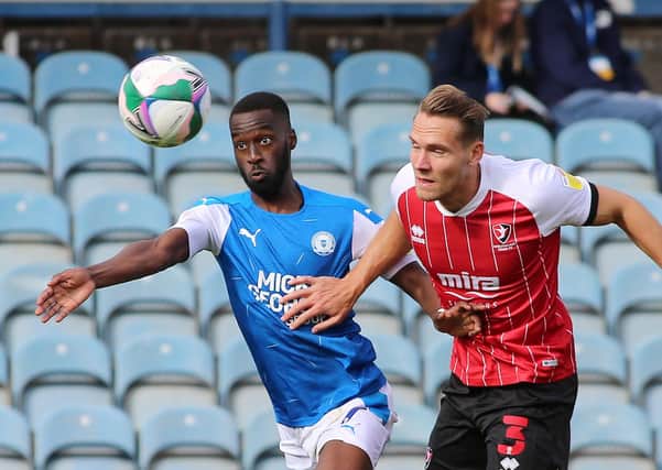 Posh striker Mo Eisa (left) is tipped to have a big season by Posh Supporters Trust chairman Marco Graziano.