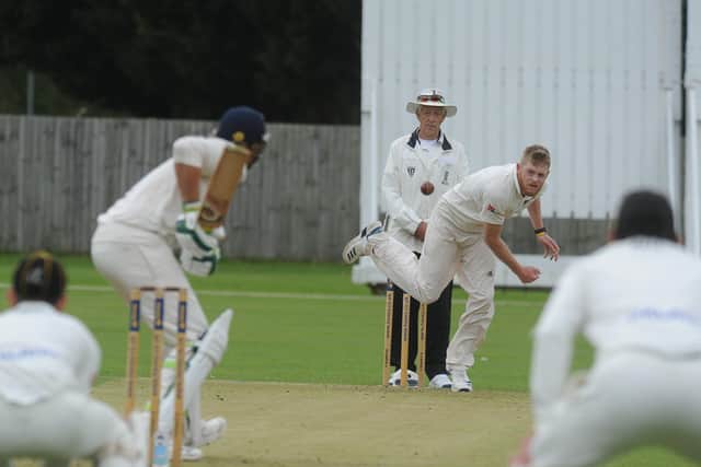 Mark Edwards bowling for Peterborough Town against Rushden & Higham. Photo: David Lowndes.