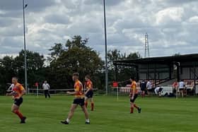 Borough players take to the field for a touch rugby event.