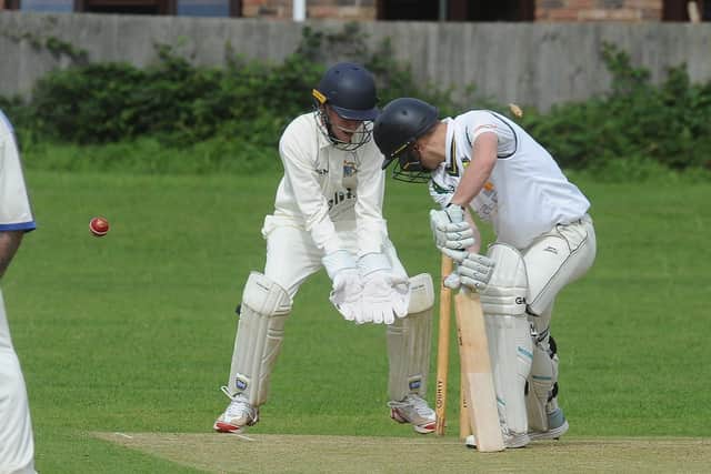 Chester Hercock of Newborough seconds is bowled in the South Lincs match against Orton Park seconds. Photo: David Lowndes.
