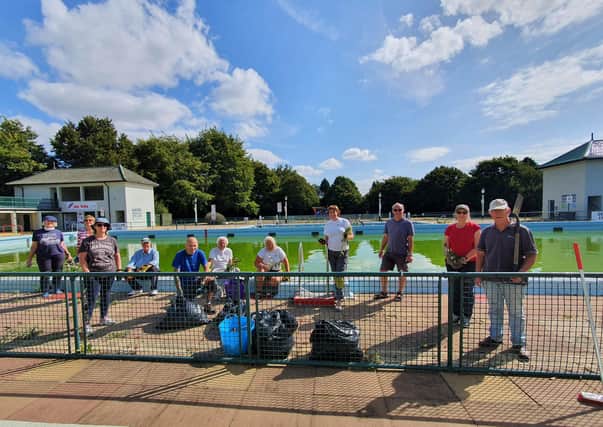 Volunteers from Friends of Peterborough Lido amidst their 'weed attack day'