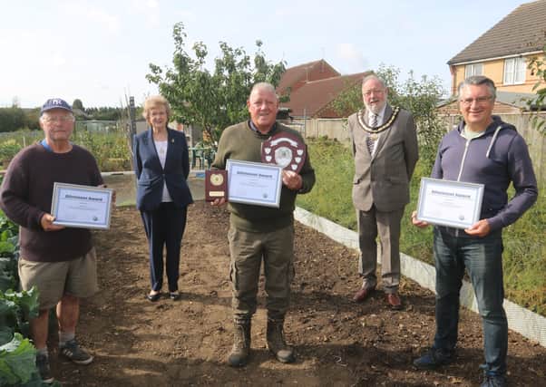 The winners of the best kept allotments with Cllr David Mason and Gill Lawrence. Photo: Robert Windle