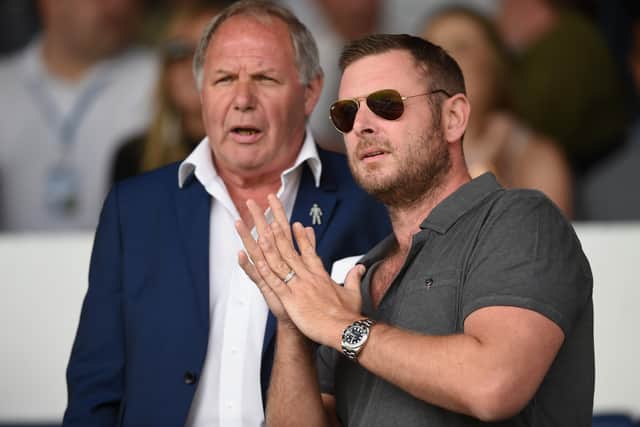 Posh co-owner Darragh MacAnthony (right) with the club's director of football Barry Fry.