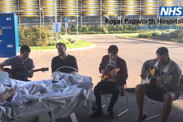 Gary's four sons are in a band from Peterborough and performed in a car park outside the hospital for their dad. EMN-200916-150250001