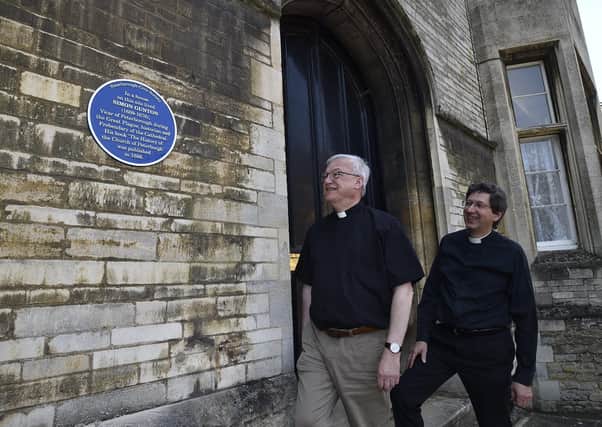 Blue plaque at 27 The Precints Peterborough Cathedral with resident Canon Ian Black and former resident Archdeacon  the Ven Gordon Steele.