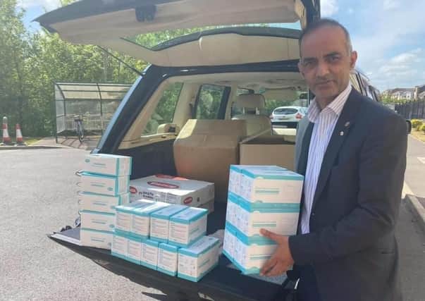 Councillor Mohammed Farooq ready to deliver supplies