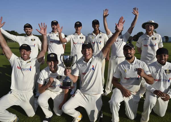 Peterborough Town players with the Northants Premier Division Cup. Photo: David Lowndes.