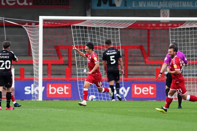 Tom Nichols celebrates a goal for Crawley. Photo: Kieran Cleeves.