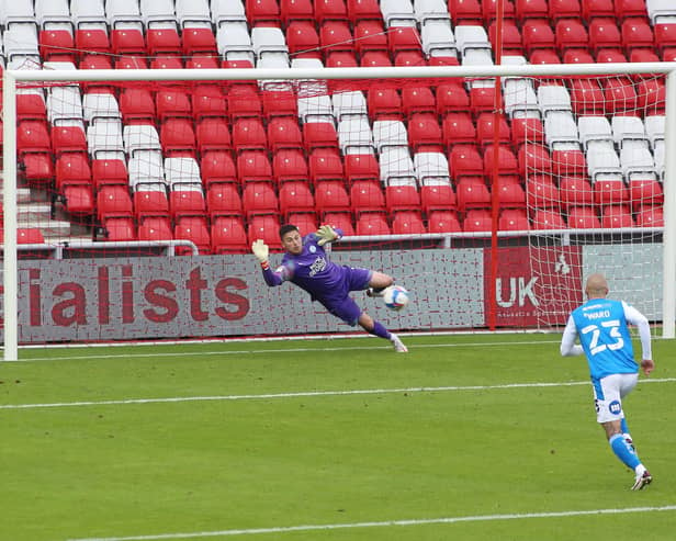 Christy Pym of Peterborough United dives in vein as Grant Leadbitter of Sunderland (not in picture) scores the only goal of the game. Photo: Joe Dent/theposh.com.