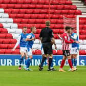 Posh players are shocked as referee Scott Oldham awards Sunderland a late penalty. Photo: Joe Dent/theposh.com.
