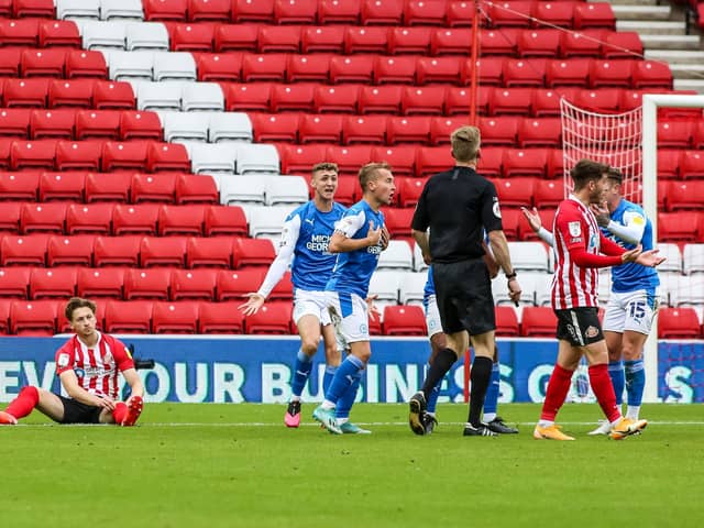 Posh players are shocked as referee Scott Oldham awards Sunderland a late penalty. Photo: Joe Dent/theposh.com.