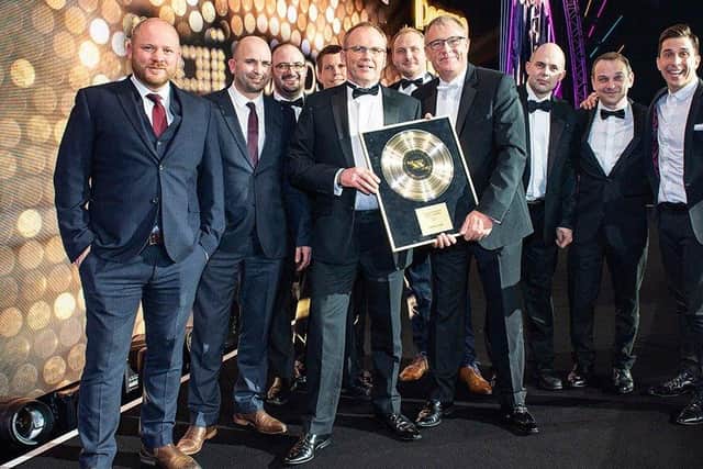 The Pearce Hire team celebrating an awards success earlier this year. IYtX8y6jWdVpPlTyS_Hf