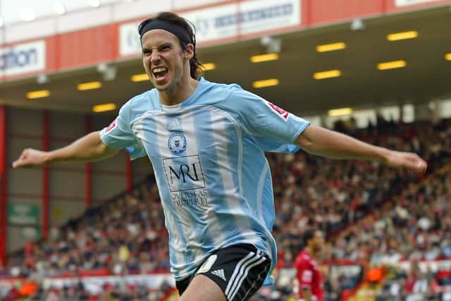 George Boyd celebrates a Posh goal.